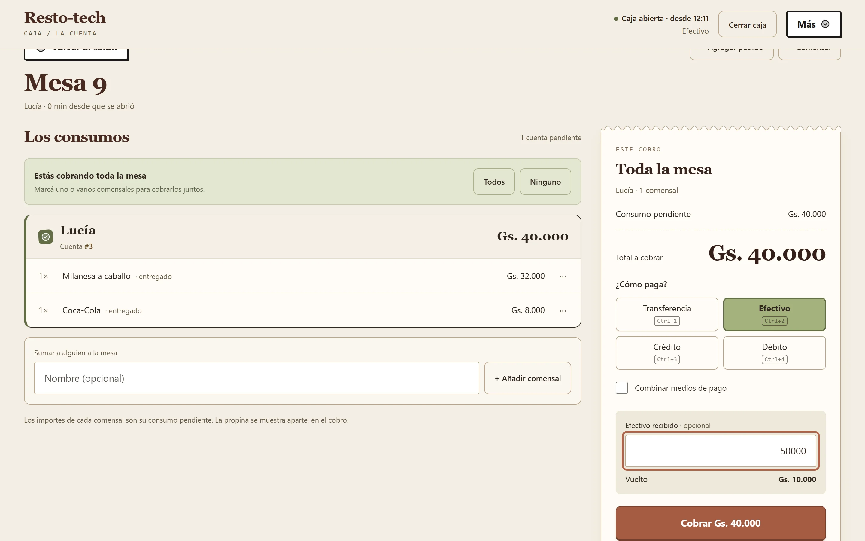 Pantalla real de caja y cálculo del vuelto